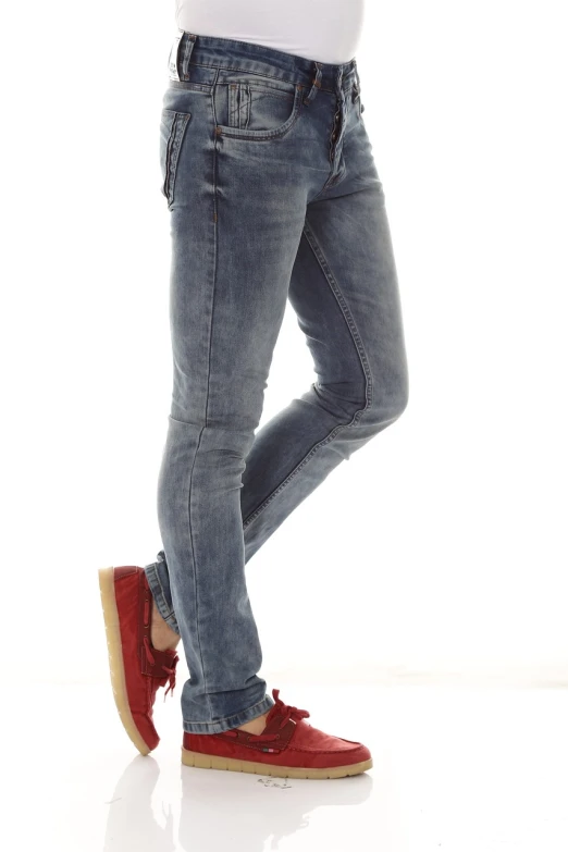 a man standing with his hands in his pockets, by John Luke, realism, tight blue jeans and cool shoes, fullbody photo, 3 colour, full body female