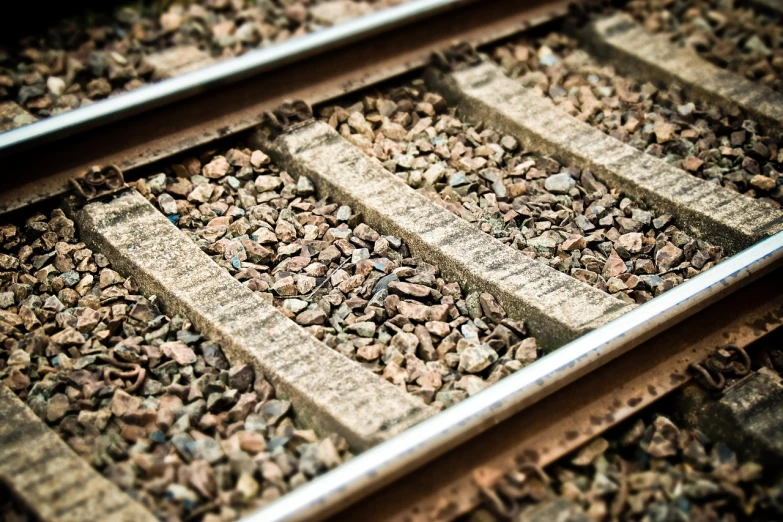 a close up of a train track with rocks on it, by Richard Carline, pr shoot, 4 0 9 6