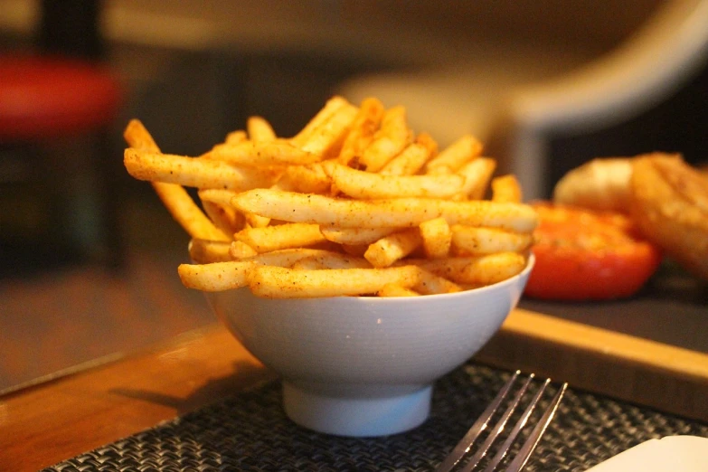 a bowl of french fries sitting on top of a table, hurufiyya, chili, caulfield, sharpie, not cropped