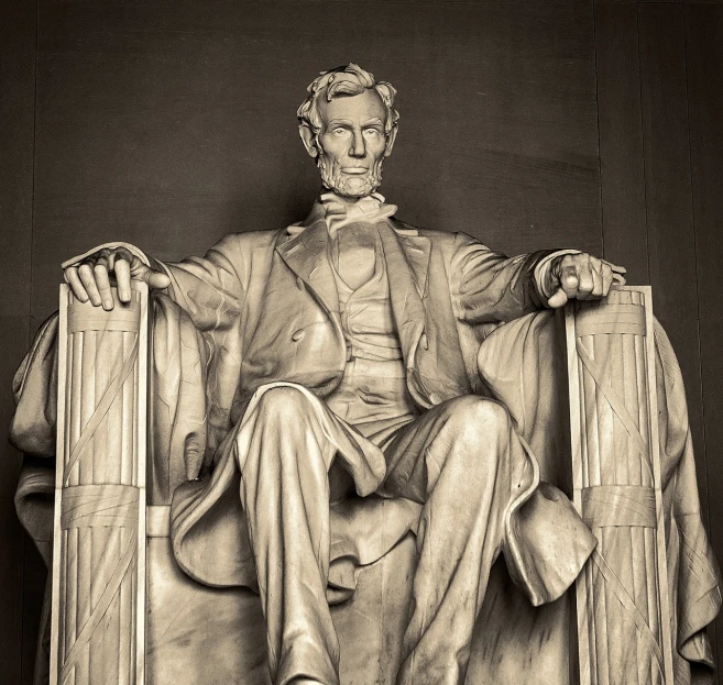 a statue of abraham lincoln sitting in a chair, a statue, shutterstock, old sepia photography, victory lap, majestic light, statue of carving marble