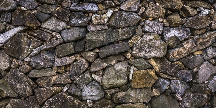 a pile of rocks sitting next to each other, a mosaic, inspired by Charles Ricketts, flickr, color ( sony a 7 r iv, wall corner, scotland, 1 6 x 1 6