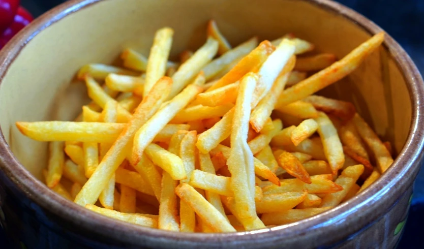 a close up of a bowl of french fries, inspired by Pia Fries, renaissance, jean paul gaultier, stunning quality, waxed, 1 1 1 1