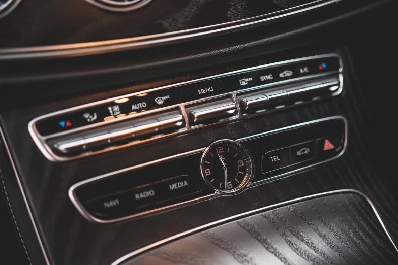 a close up of the dashboard of a car, les automatistes, mercedez benz, interior photography, radio, photo 85mm