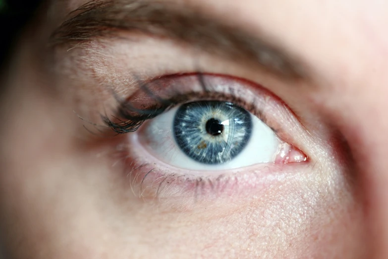 a close up of a person's blue eye, a macro photograph, hyperrealistic flickr:5, highly detailed photo, accurate and detailed, a very macular woman in white