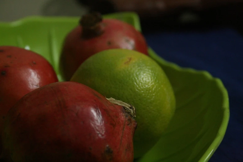 three pomegranates and two limes on a green plate, flickr, sri lanka, beets, [ closeup ]!!, mango