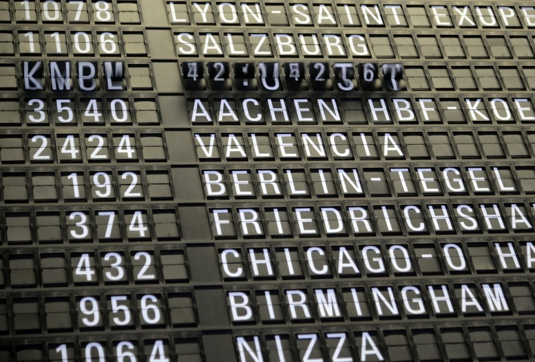 a close up of a sign with numbers on it, international typographic style, the other is used for flight, berlin, ap photo, benjamin vnuk