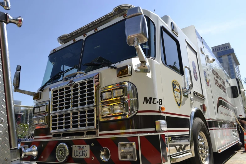 a fire truck parked on the side of the road, by Mac Conner, flickr, close up front view, cfd, mechabot, seen from below