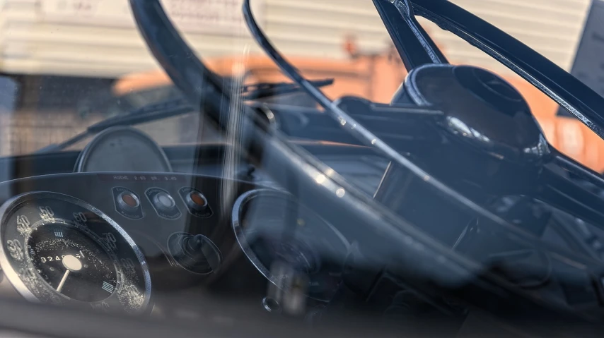 a close up of the dashboard of a car, by David Simpson, photorealism, smooth transparent visor, hero shot, cockpit, f / 1