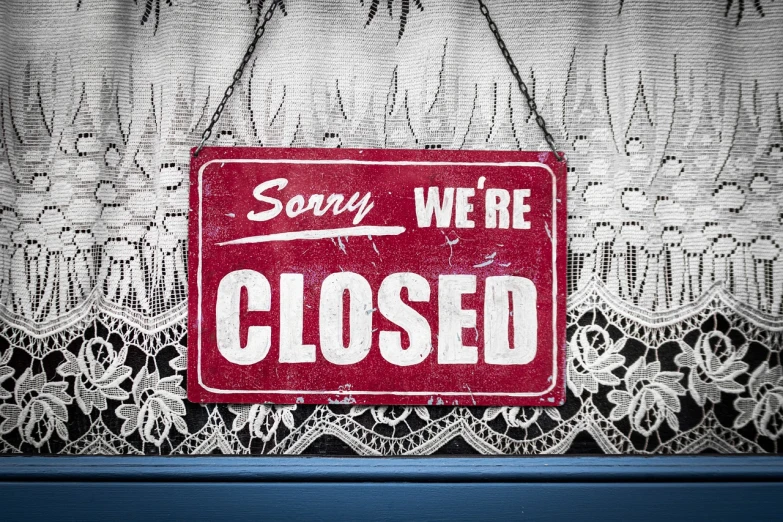 a red and white sign that says sorry we're closed, a photo, by Kurt Roesch, pixabay, folk art, sony pictures, 🦩🪐🐞👩🏻🦳, 80s photo, glass