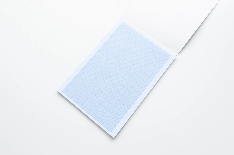 a close up of a piece of paper on a table, by Shigeru Aoki, unsplash, sōsaku hanga, lattice, set against a white background, light blue, high quality product photo