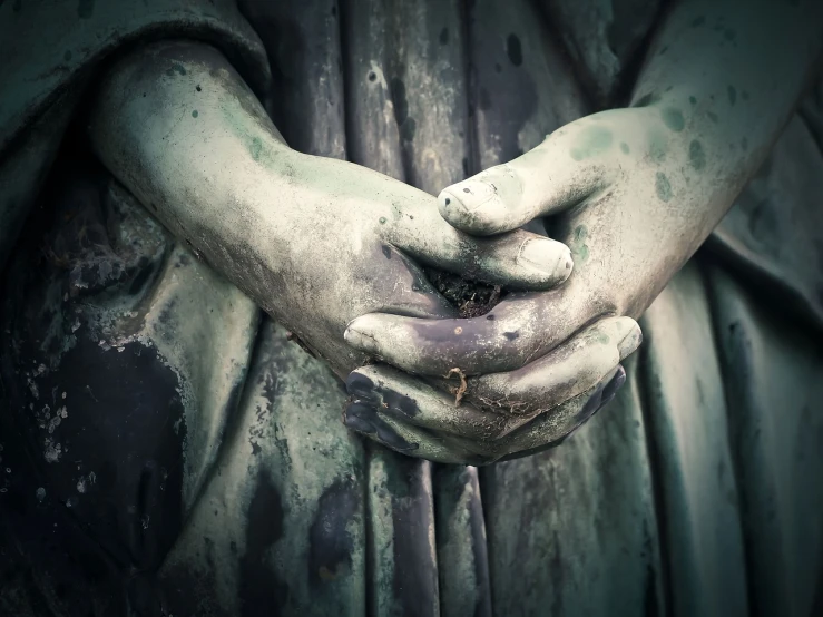 a statue of a person holding a plant in their hands, a statue, by Adam Szentpétery, shutterstock, romanticism, grungy gothic, hands pressed together in bow, patina, folded arms