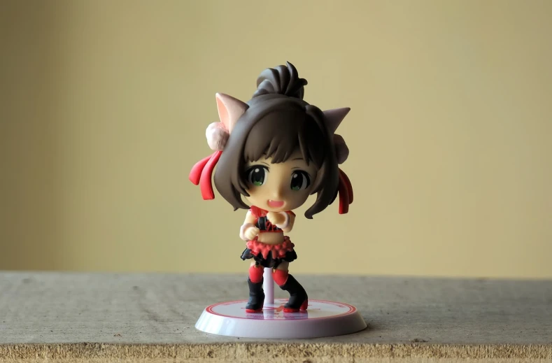 a close up of a figurine on a table, by Jin Homura, pixiv, mingei, cute!! chibi!!! catgirl, on a stage, rin tohsaka, full body wide shot