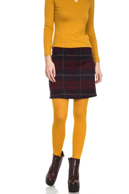 a woman in a yellow sweater and a plaid skirt, inspired by Grytė Pintukaitė, shutterstock, tights, deep colour\'s, full product shot, quechua