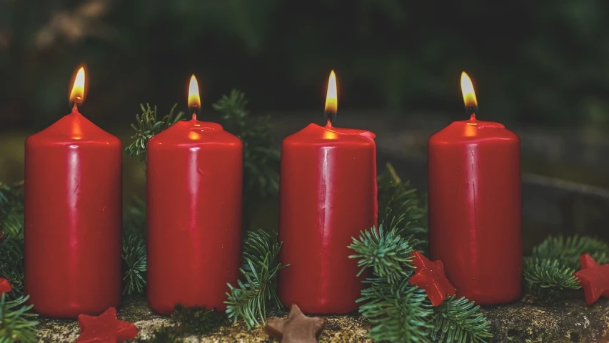 a group of three red candles sitting next to each other, pexels, fine art, evergreen branches, countdown, 🦩🪐🐞👩🏻🦳, holy ceremony