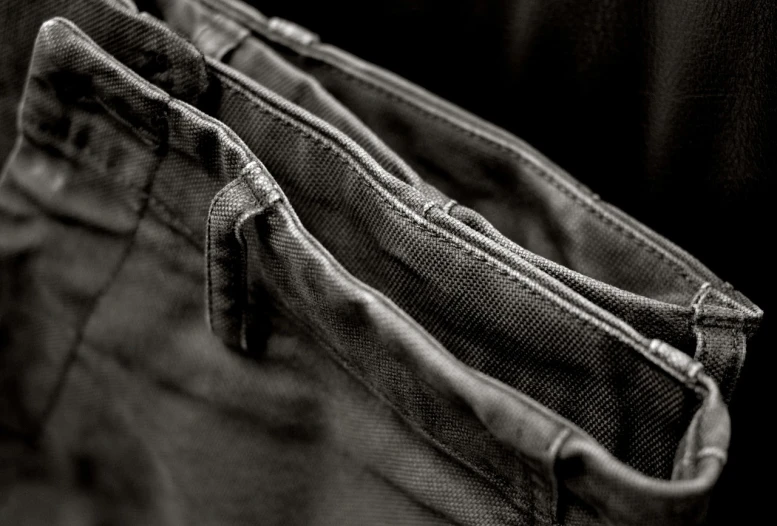 a black and white photo of a pair of jeans, a macro photograph, by Thomas Häfner, renaissance, cargo pants, hdr detail, khakis, packshot