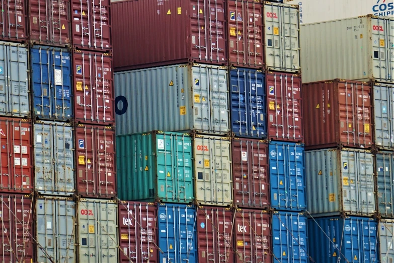 a bunch of containers stacked on top of each other, by Richard Carline, zoomed in shots, wikipedia, panel, seams