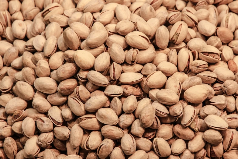 a pile of pistas sitting on top of each other, pexels, hurufiyya, nut, smooth texture, arizona, listing image