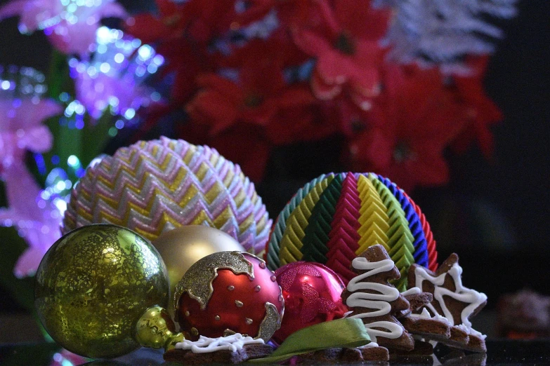 a bunch of christmas ornaments sitting on top of a table, a still life, inspired by Jeff Koons, pexels, process art, dessert, wikimedia commons, ribbons and flowers, full of colour 8-w 1024