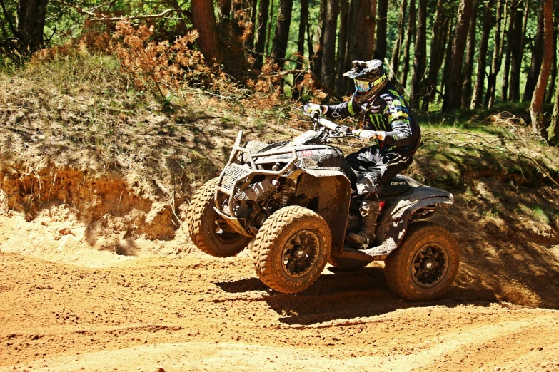 a person riding an atv on a dirt road, a photo, view from the side”, mateus 9 5, outdoor photo, intense detail