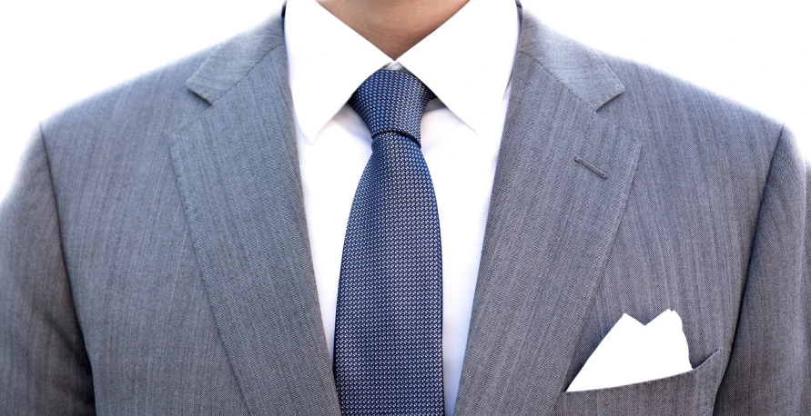 a close up of a person wearing a suit and tie, inspired by david rubín, renaissance, blue grey and white color scheme, corporate boss, work clothes, dress shirt and tie