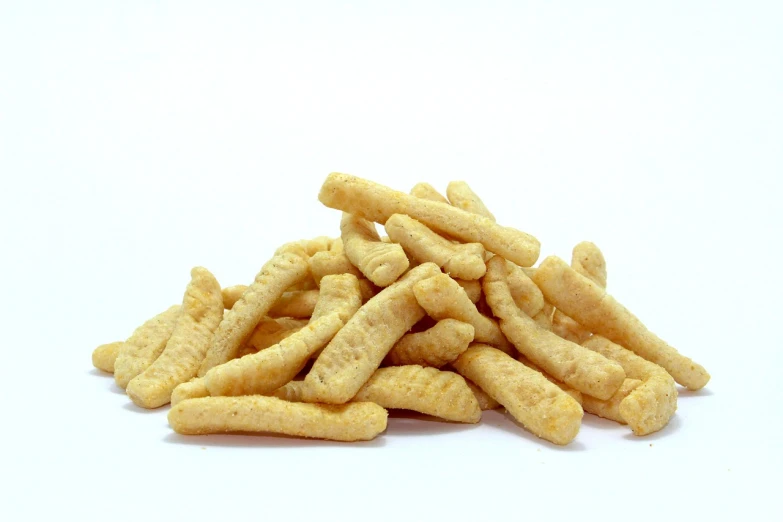 a pile of crackers sitting on top of a white surface, neo-dada, larvae, high detail product photo, corn, close-up product photo