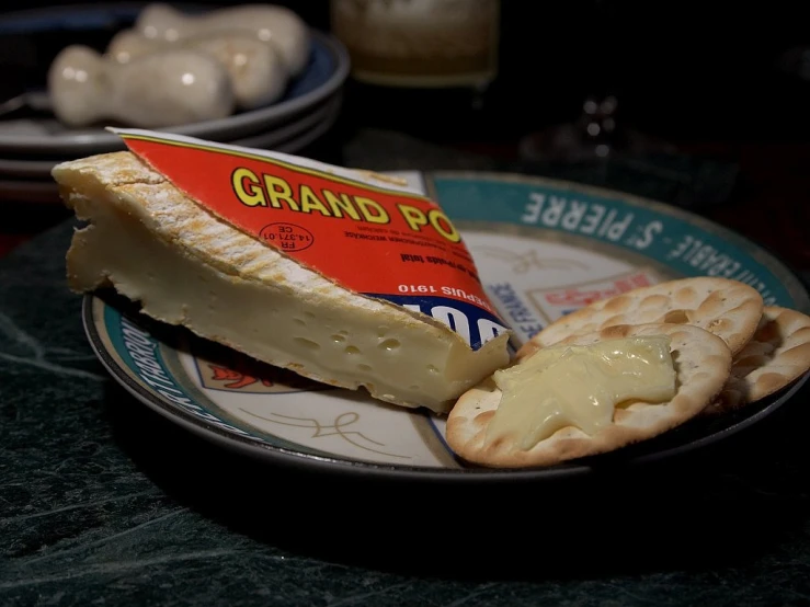 a plate of cheese and crackers on a table, by Johan Grenier, flickr, pop art, inside a grand, tillamook cheese, <pointé pose>;open mouth, pbr