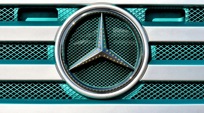 a close up of a mercedes emblem on a car, a digital rendering, inspired by Jan Kupecký, photorealism, cyan and green, truck, paris 2010, metallic shutter