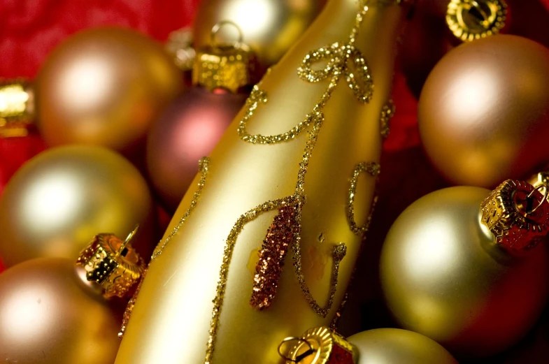 a close up of a bunch of christmas ornaments, shutterstock, process art, champagne, 2 0 1 0 photo, “ golden chalice, bottle
