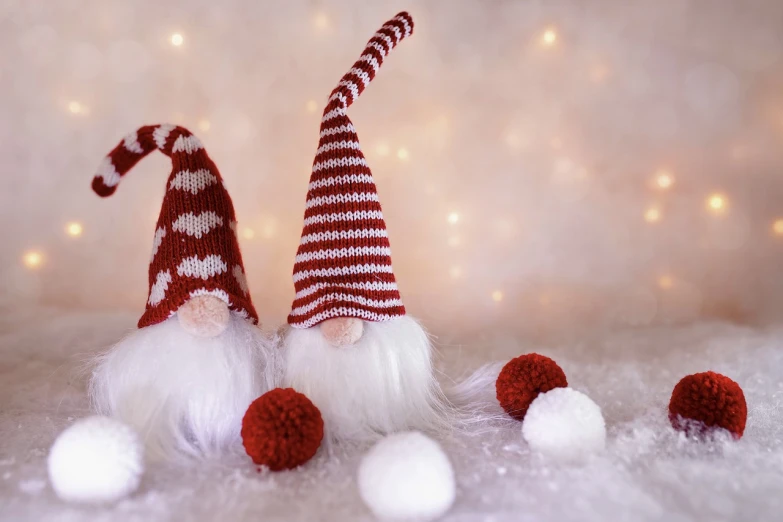 a couple of gnomes sitting next to each other, a picture, pexels, folk art, knitted hat, red and white lighting, wallpaper hd, red and white stripes