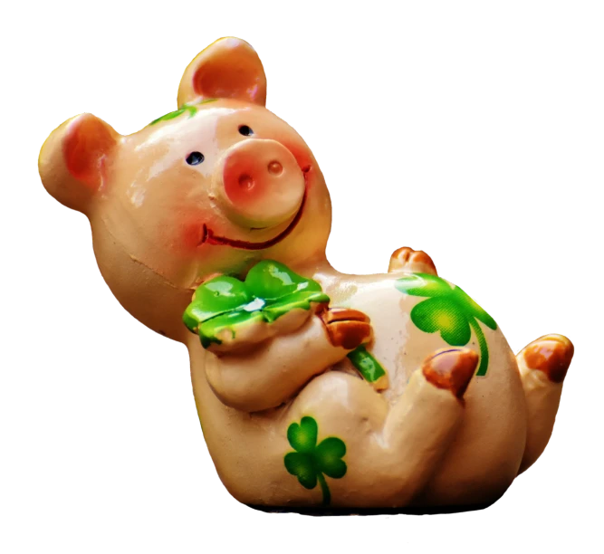 a close up of a figurine of a pig, a photo, by Yi Jaegwan, trending on pixabay, digital art, four leaf clover, on black background, creamy, celtics