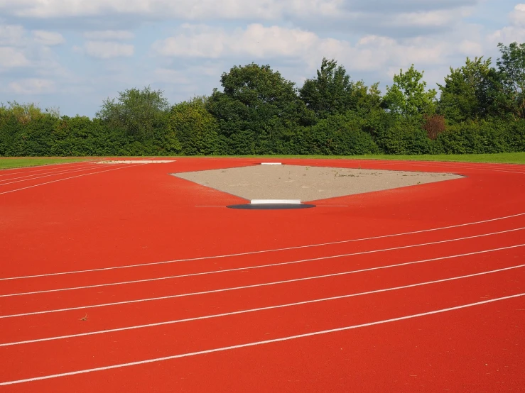 a baseball diamond sitting on top of a red field, by Thomas de Keyser, process art, sprinters in a race, concrete, 1 0 0 m, panels