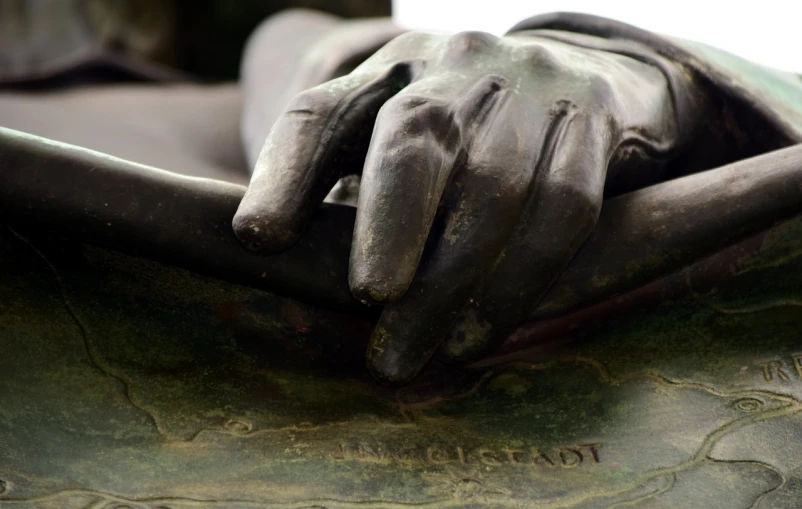 a close up of a person's hand on a statue, a bronze sculpture, by Sir Jacob Epstein, flickr, 4 k detail, 19th-century, resting, highly detailled