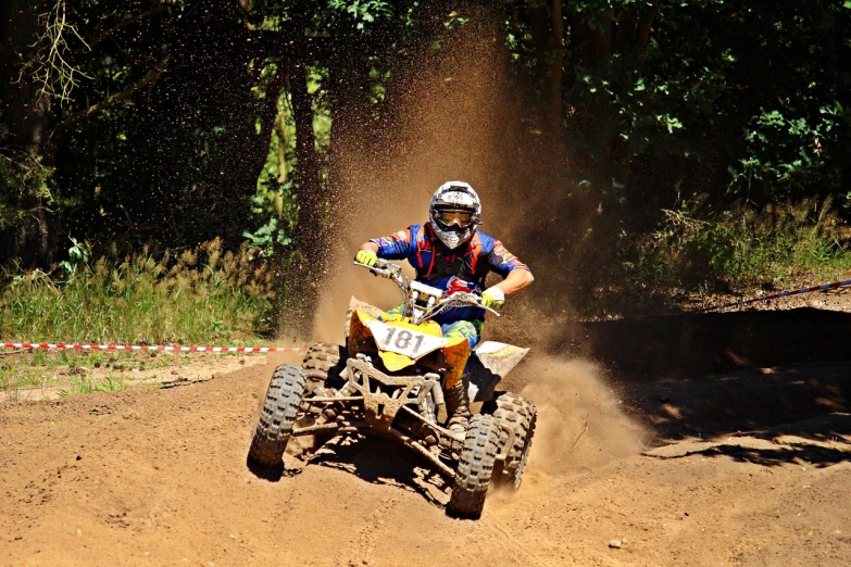 a man riding on the back of a dirt bike, a photo, flickr, figuration libre, all terrain vehicle race, avatar image