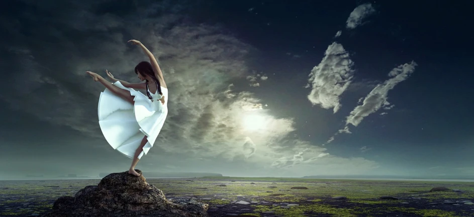 a woman in a white dress standing on a rock, by Cyril Rolando, surrealism, dynamic dance photography, karol bak uhd, girl clouds, brunette fairy woman stretching