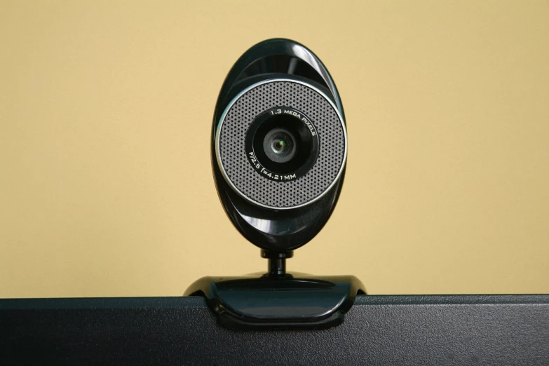a web camera sitting on top of a desk, by Joy Garnett, high quality product image”, looking straight into camera, eyeball, desktop computer