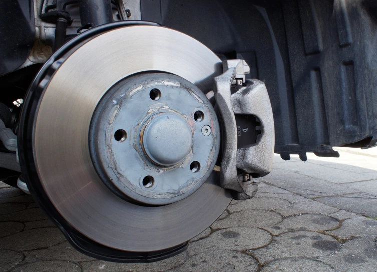 a close up of a brake on a truck, shutterstock, hyperrealistic shaded, fully body photo, stock photo