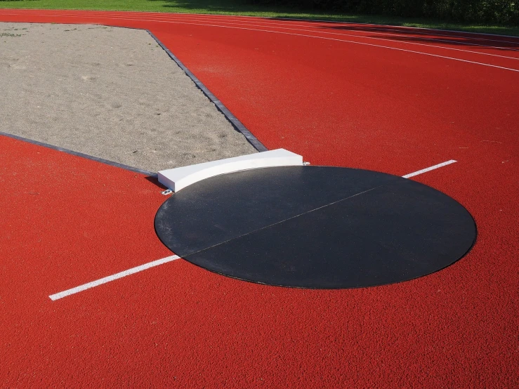 a tennis court with a hole in the middle of it, by Thomas Häfner, dribble, red shell. dirt track, sundial, aluminium, ultra - high jump