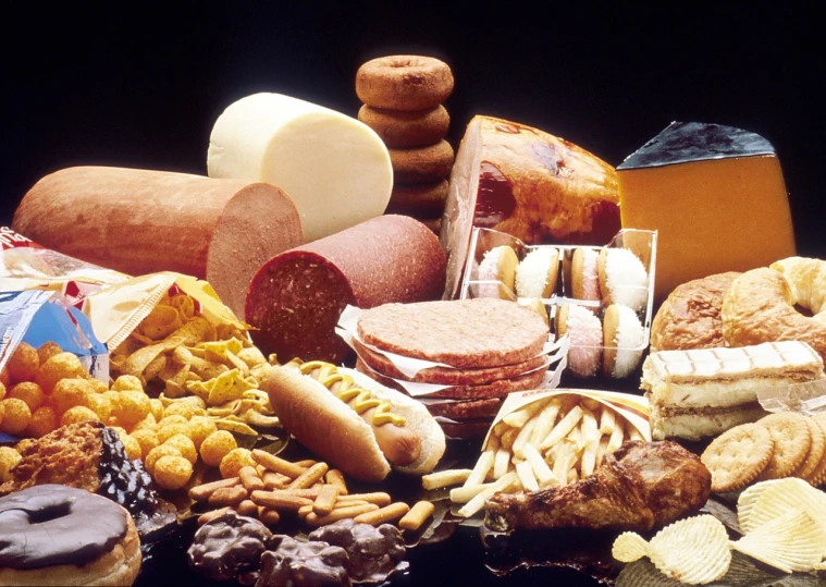 a table topped with lots of different types of food, a picture, by Dietmar Damerau, hyperrealism, steroids, istockphoto, with bread in the slots, black