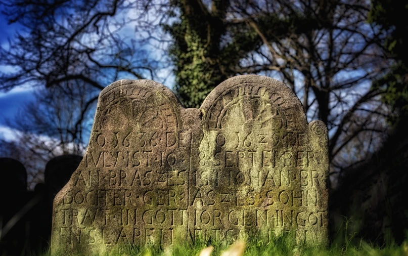 a couple of tombstones sitting next to each other, inspired by John Rhind, flickr, graffiti, 1666, hdr detail, warm spring, old script