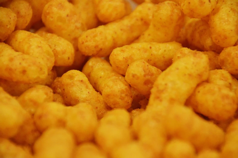 a close up of a pile of tater tots, a macro photograph, inspired by Pia Fries, corn chess board game, worms intricated, rockets, closeup photo