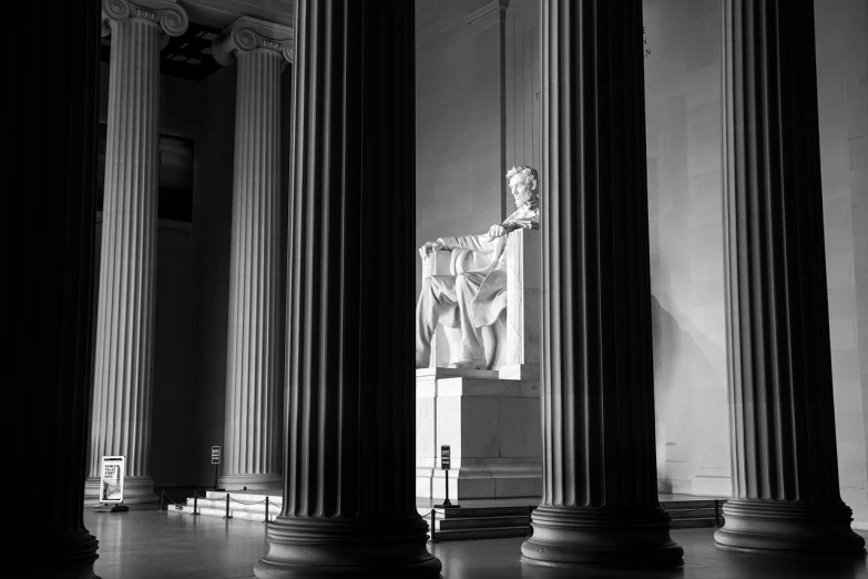 a black and white photo of the lincoln memorial, a statue, by Andrew Domachowski, visual art, bright light masterpiece, sitting down, pillars, marketing photo