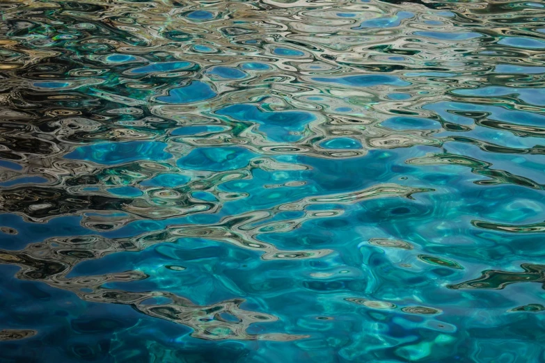 a boat floating on top of a body of water, a photorealistic painting, by Jan Rustem, pexels, hyperrealism, ocean pattern, venetian glass, pools of water, ibiza