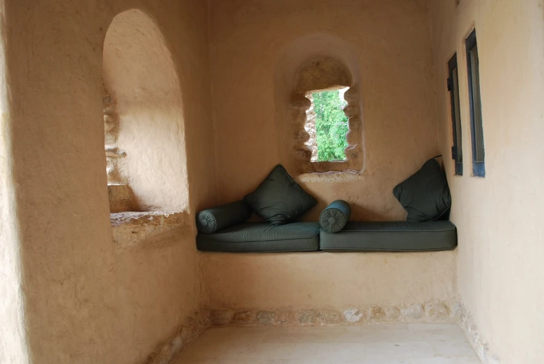 a room with a couch and a window, les nabis, grotto, oud, benches, perfect detail