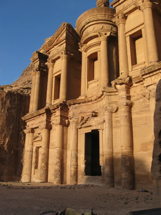 a horse that is standing in front of a building, a picture, baroque, jordan, archeological discover, qwek dom, you can see all the passageways