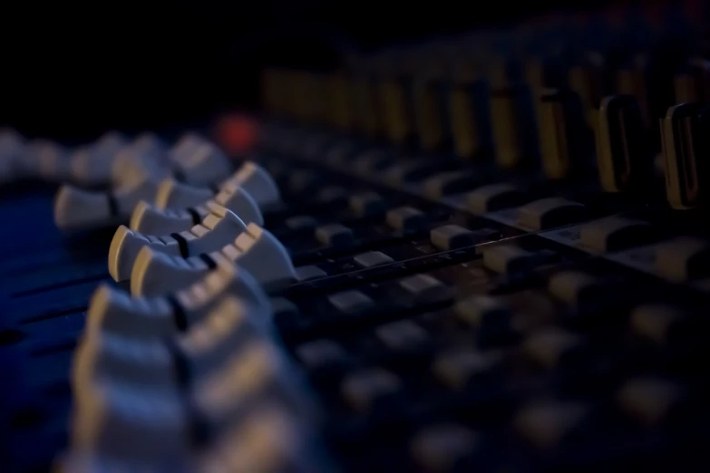 a close up of a keyboard in a dark room, inspired by Niko Henrichon, mixer rendering, hd wallpaper, in a row, softly - lit