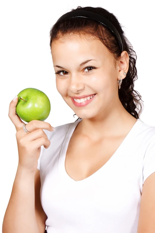 a woman holding an apple in one hand and a green apple in the other, by John Luke, shutterstock, figuration libre, smiling young woman, profile picture 1024px, 🍸🍋, with a beautifull smile