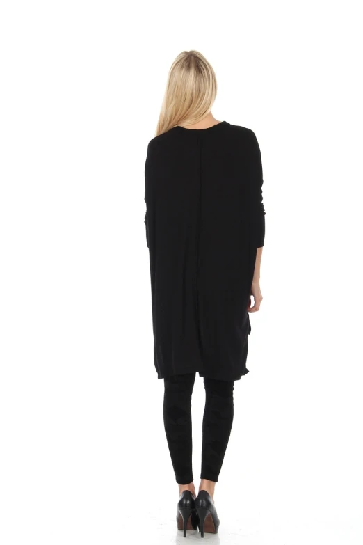 a woman standing with her back to the camera, a picture, shutterstock, bauhaus, black tunic, - h 1 0 2 4, black oversized clothes, fullbody photo