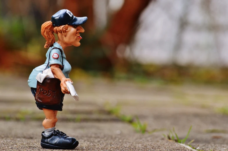 a figurine of a woman holding a baseball bat, a cartoon, by Jesper Knudsen, pixabay contest winner, photorealism, police officer, delivering mail, pissed off, postman pat