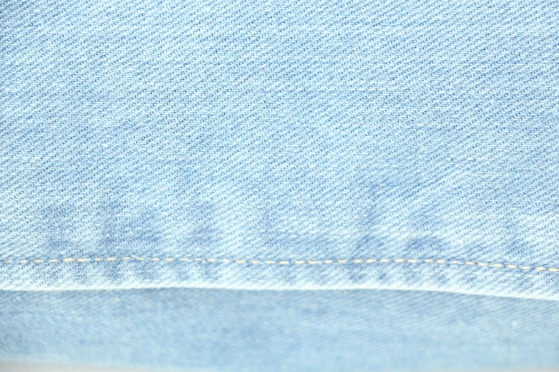 a close up of a pair of blue jeans, a screenshot, inspired by Saitō Kiyoshi, ultra high pixel detail, detailed photo of an album cover, pale blue backlight, realistic fabric