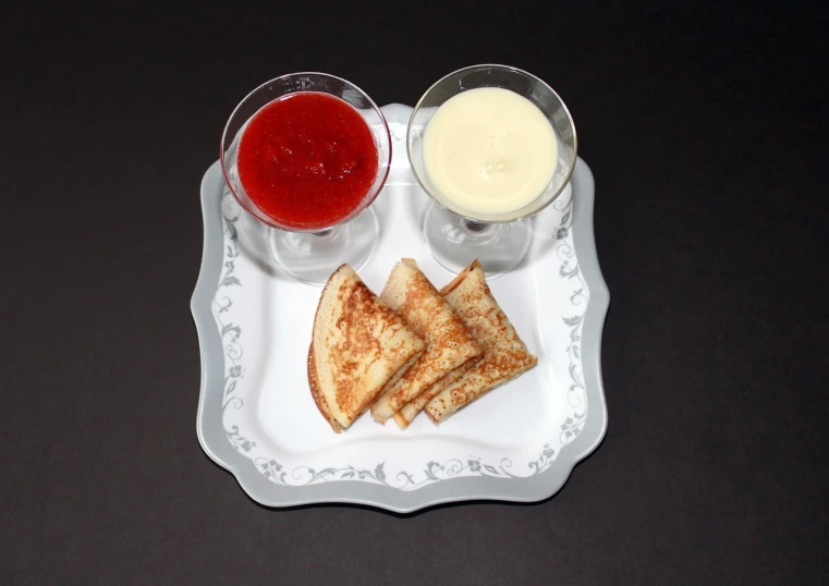 a close up of a plate of food on a table, by Kurt Seligmann, tumblr, dau-al-set, toast, white and blood color scheme, symmetric!, jello